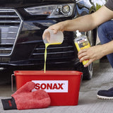 SONAX Wasch & Wax (500 ml) gründliche Schmutzentfernung und dauerhafter Schutzfilm aus natürlichem Carnauba-Wachs